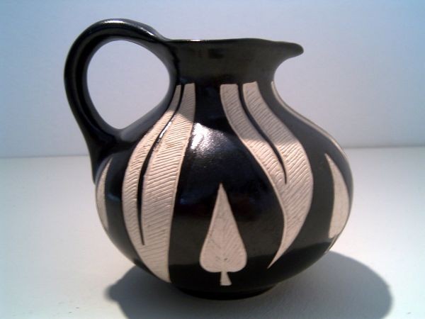 Jug vase with leaf relief
