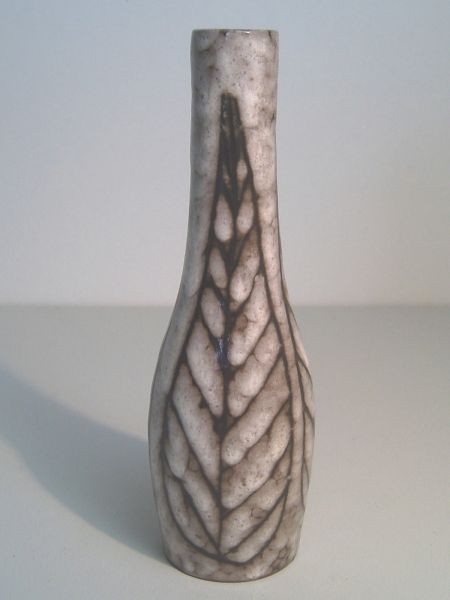 Elegant bottle vase with leaf decor